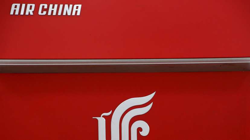 Air China's logo is seen on a counter of Air China at a terminal of Beijing Capital International Airport in Beijing