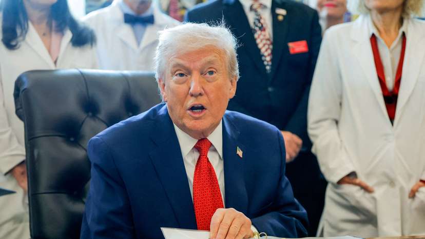 U.S. President Trump signs executive orders at the Oval Office, in Washington