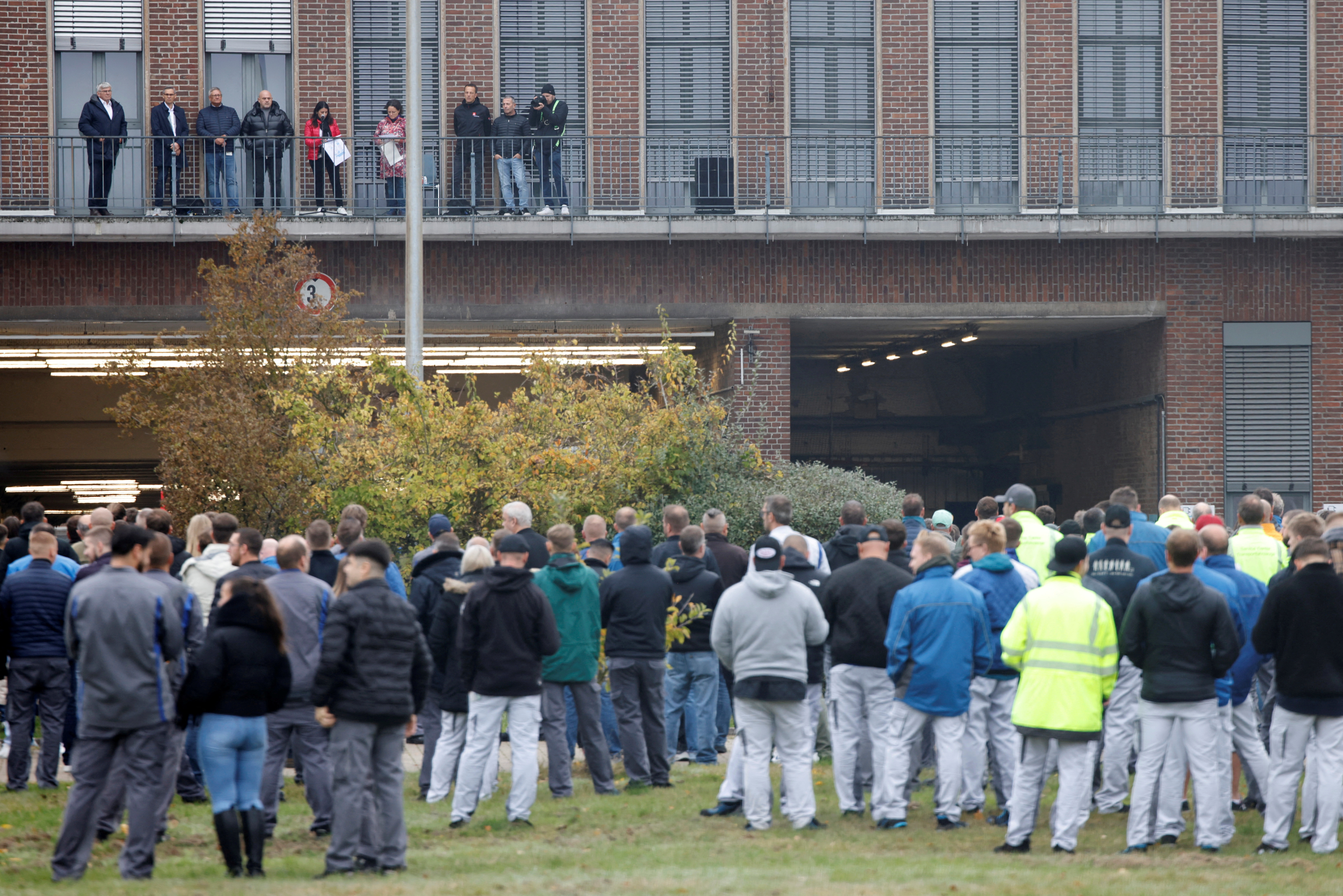 Daniela Cavallo, Chairwoman of the General and Group Works Council of Volkswagen AG, speaks to employees announcing job cuts, at the company's headquarters in Wolfsburg