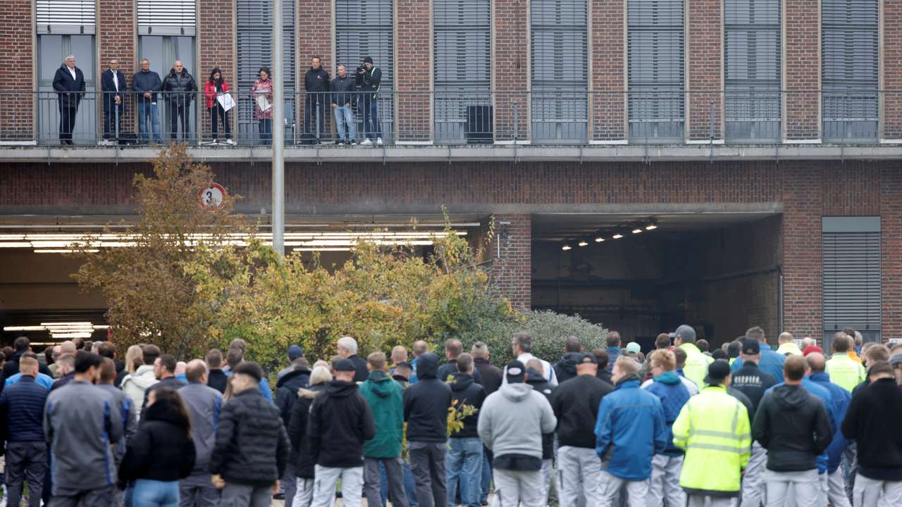 Daniela Cavallo, Chairwoman of the General and Group Works Council of Volkswagen AG, speaks to employees announcing job cuts, at the company's headquarters in Wolfsburg