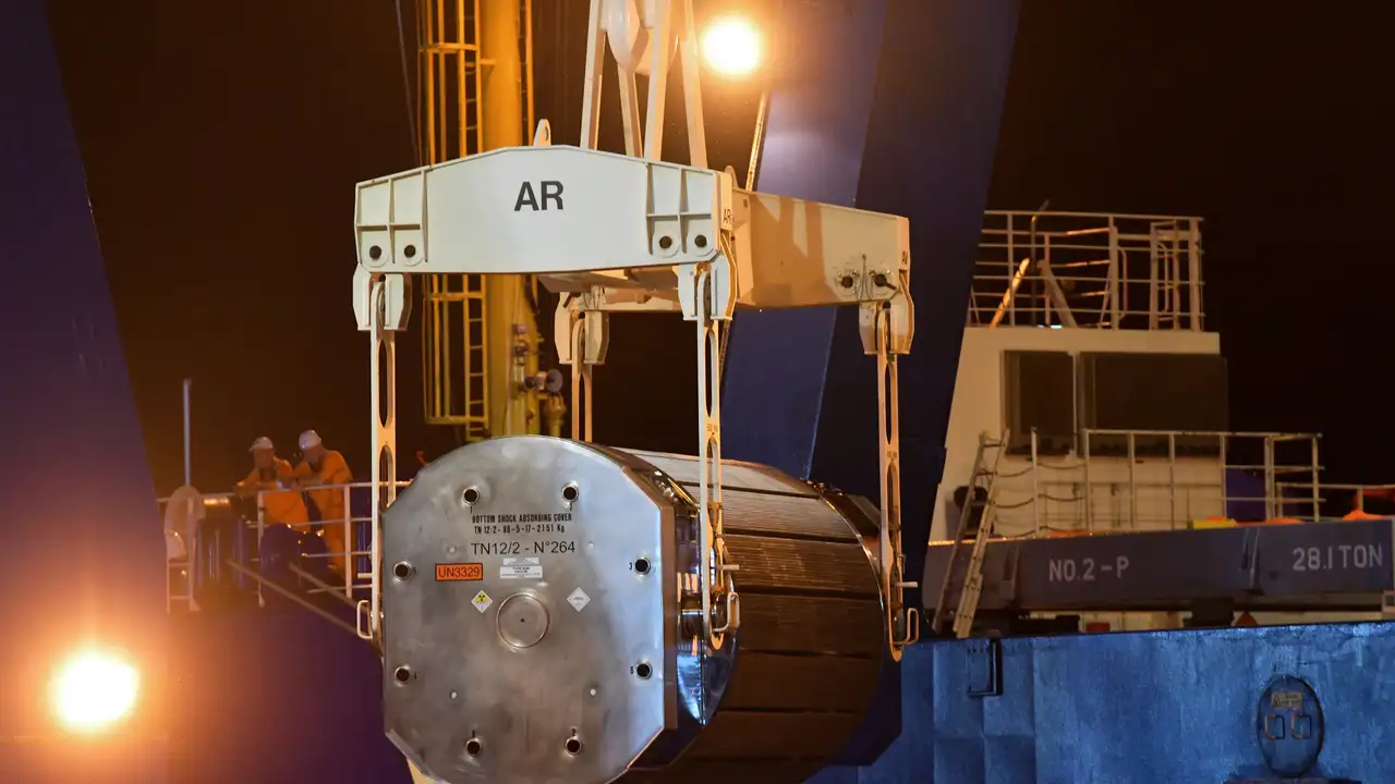 A container of radioactive Mixed Oxide Fuel (MOX) is charged onboard of a ship, at the harbour of Cherbourg-Octeville, northwestern France.
