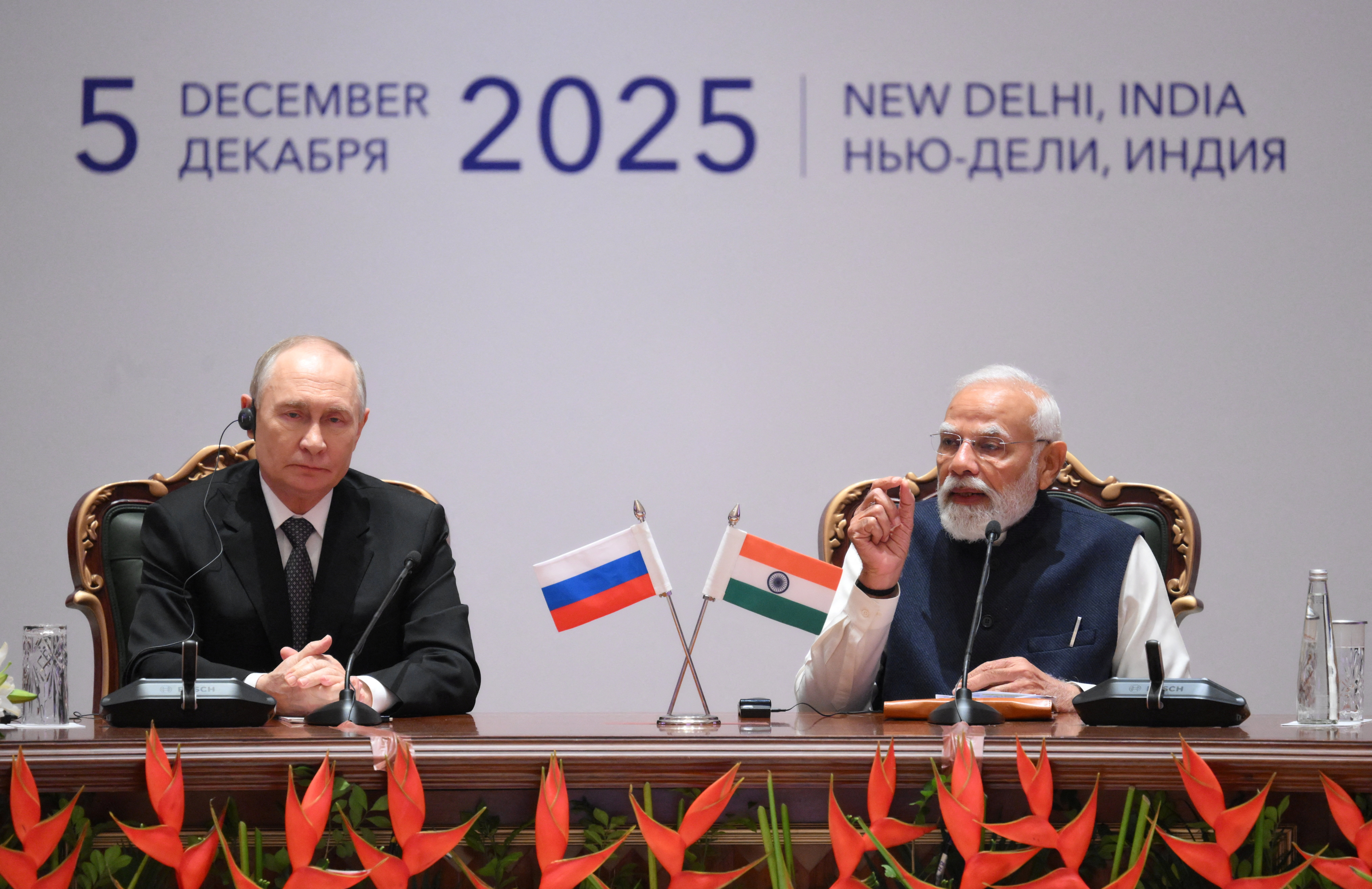 Russia's President Putin and India's Prime Minister Modi attend business forum in New Delhi