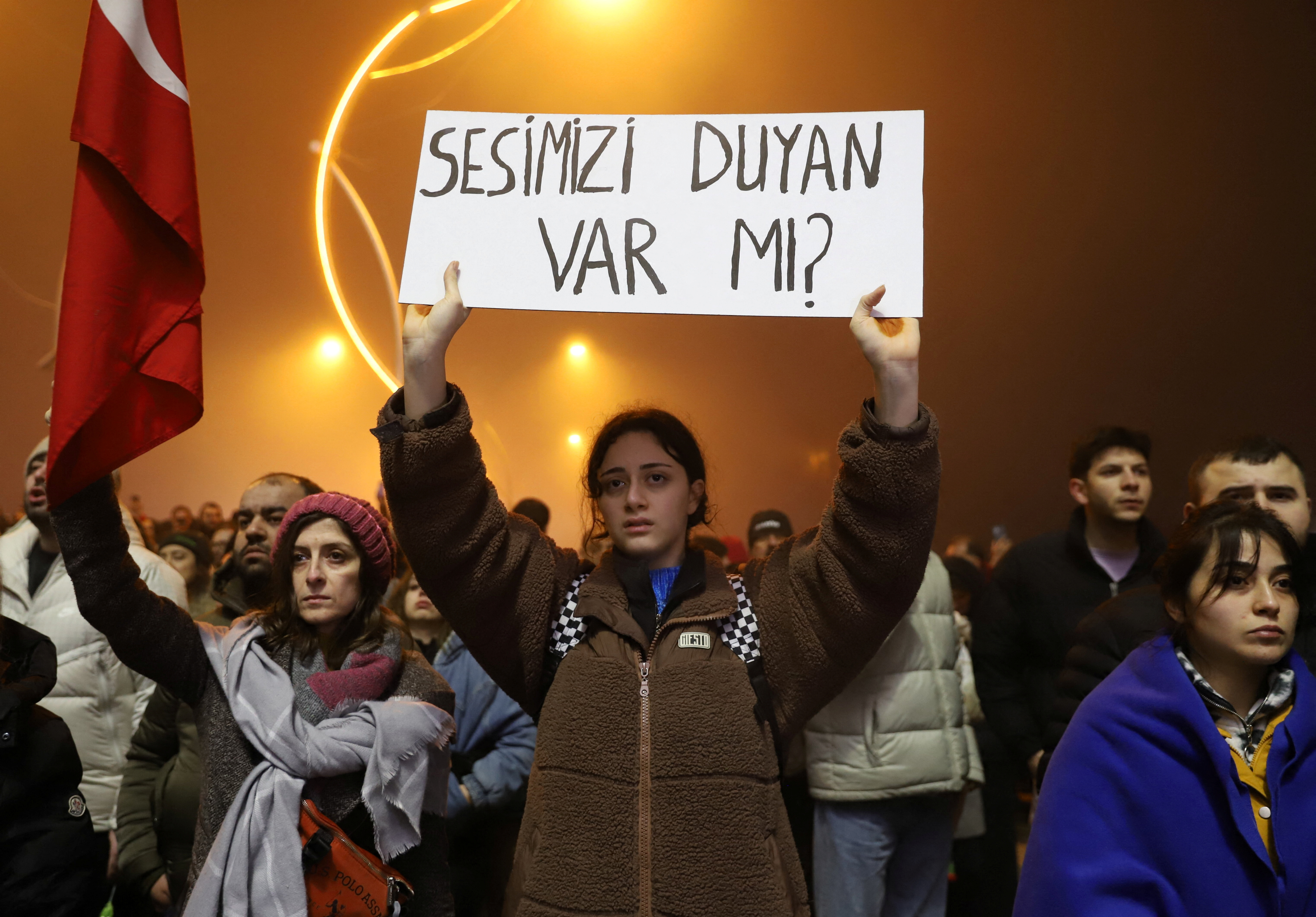 People gather to commemorate the one-year anniversary of the devastating earthquake, in Hatay