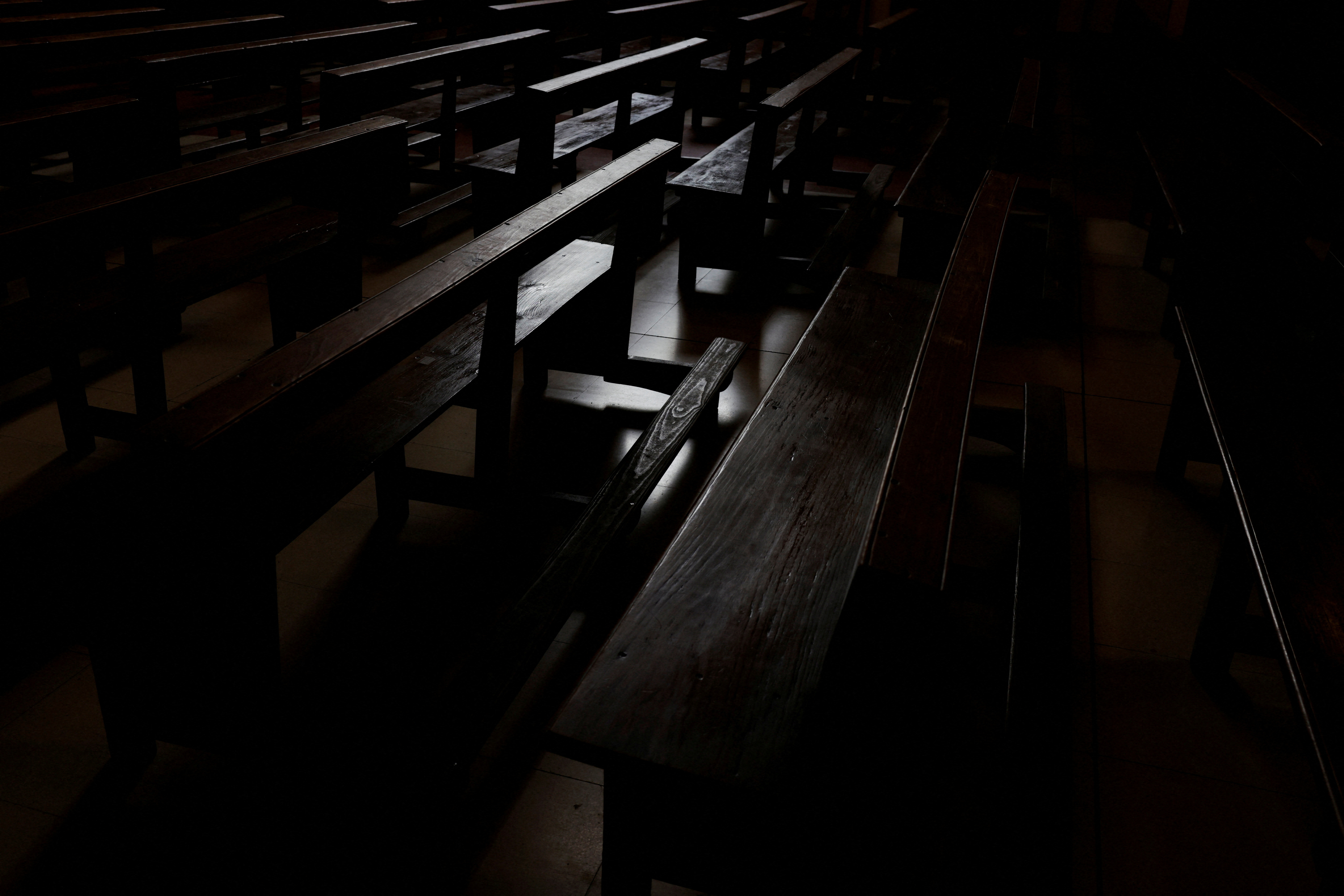 FILE PHOTO: Empty pews are seen inside Catholic church in Madrid