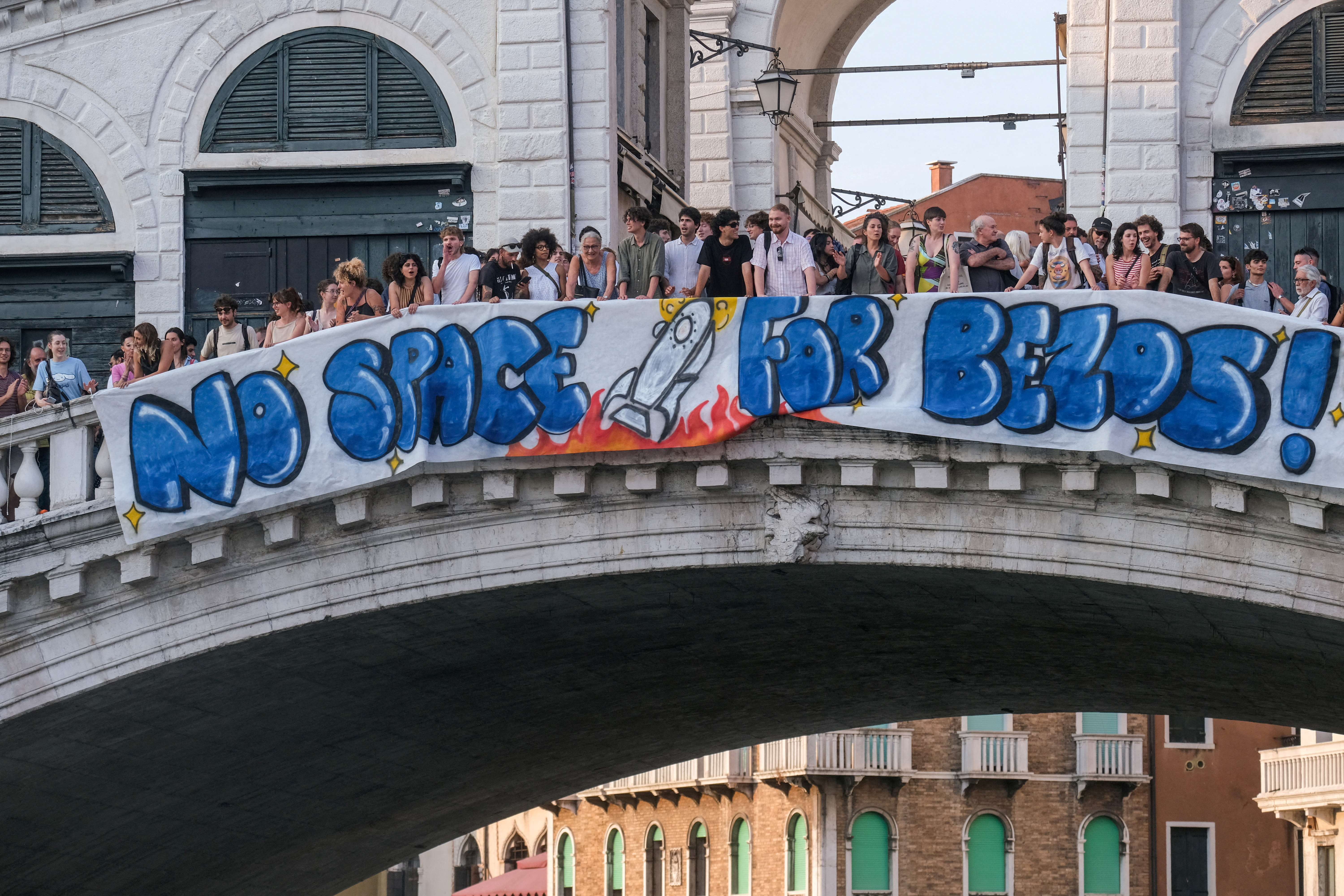 FILE PHOTO: Venice protesters hang anti-Bezos banner on the Rialto Bridge ahead of billionaire's wedding