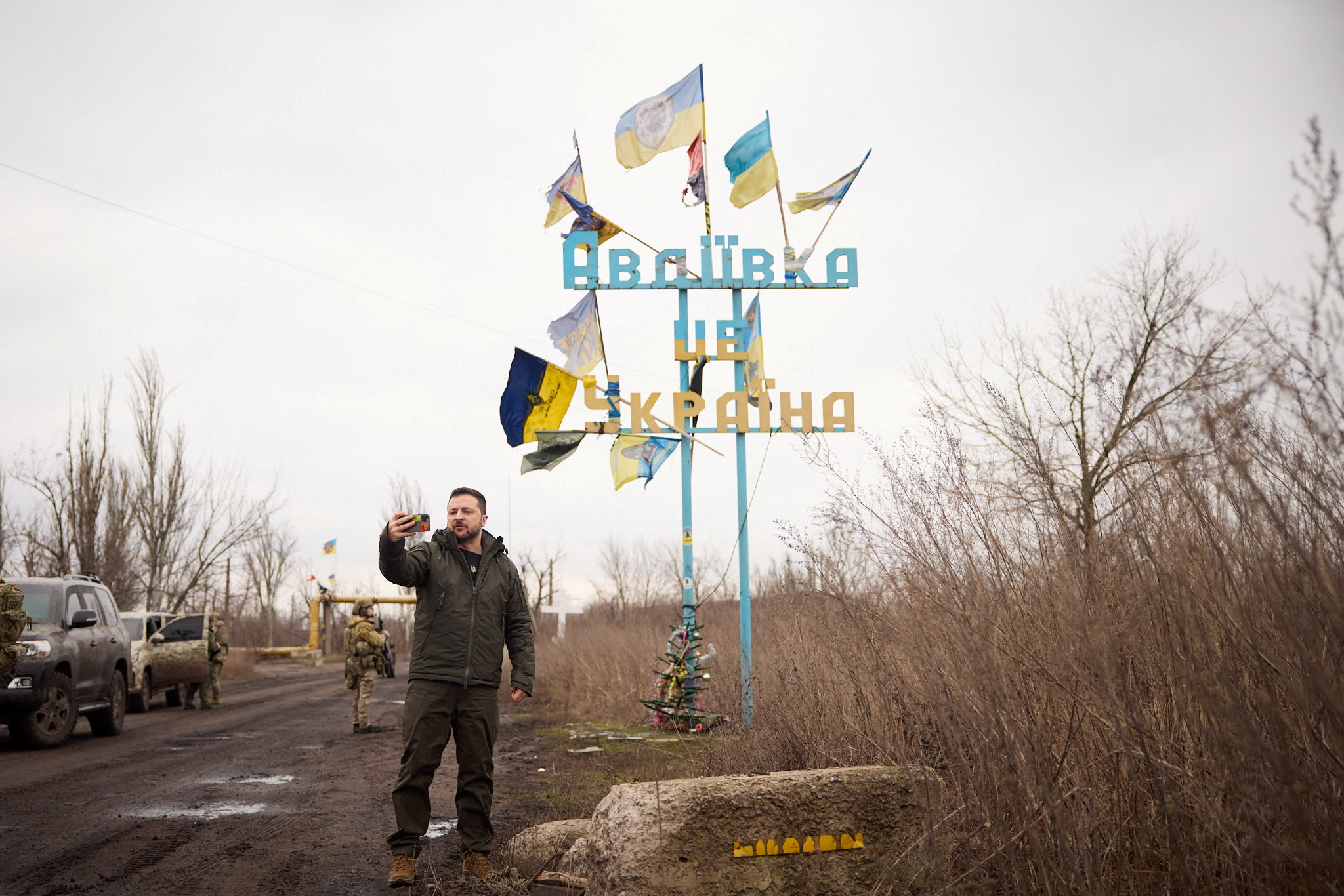 Ukraine's President Zelenskiy takes a video, as he visits in the frontline town of Avdiivka