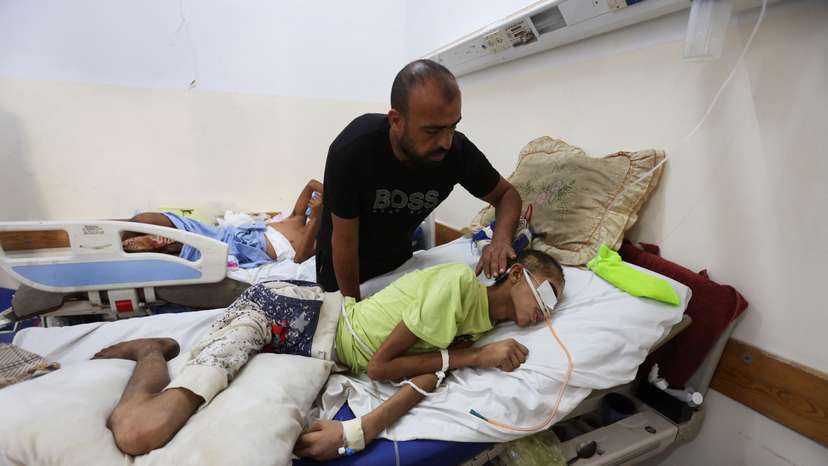 Gaza father hopes reopening of medical corridor can save his injured son in Khan Younis