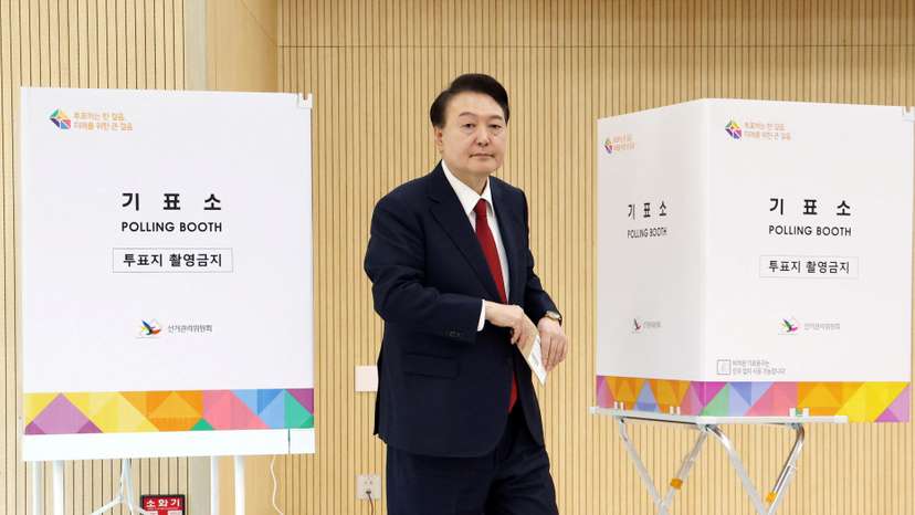 South Korean President Yoon Suk Yeol casts his early vote for 22nd parliamentary election, in Busan