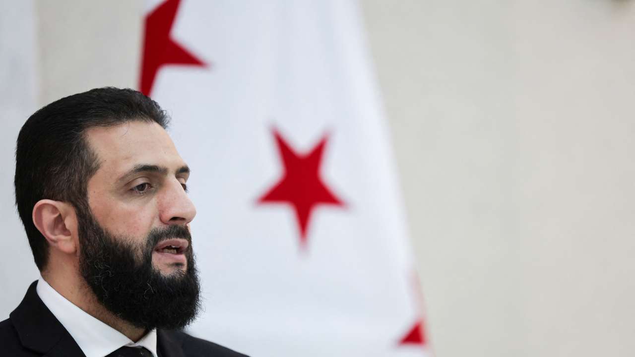Syria’s interim President Ahmed al-Sharaa attends an interview with Reuters