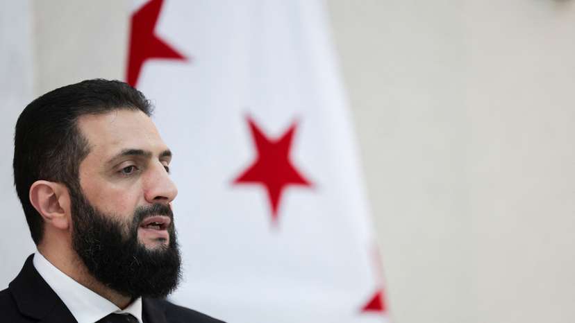 Syria’s interim President Ahmed al-Sharaa attends an interview with Reuters