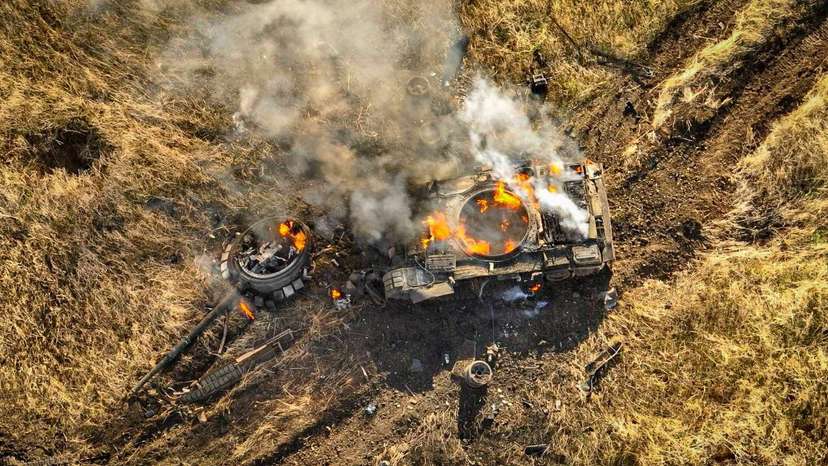 FILE PHOTO: Russian tank burns in a field near the town of Vuhledar