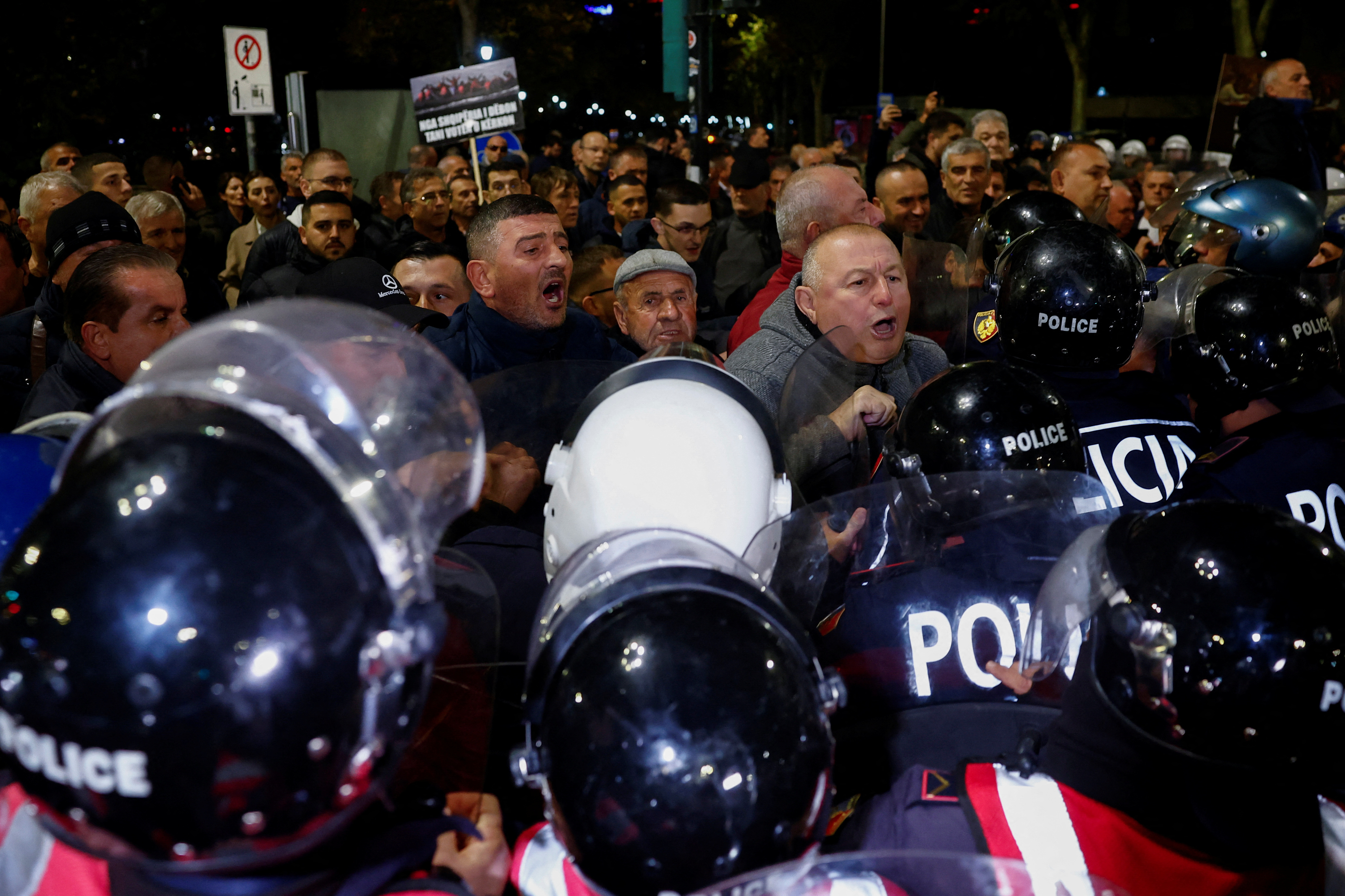 Supporters of Albanian opposition block the roads as part of a civil disobedience demanding  a provisional technocratic government in Tirana