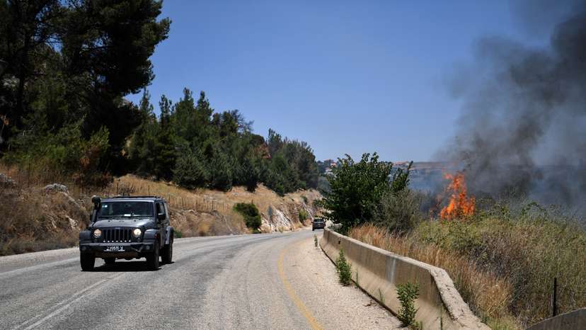 A fire blazes on the Israeli side of the Israel-Lebanon border following attacks from Lebanon, amid cross-border hostilities between Hezbollah and Israeli forces