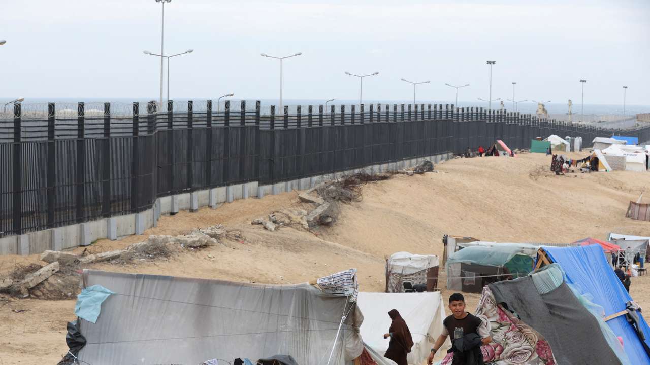 Palestinians shelter at the border with Egypt, amid fears of an exodus of Palestinians into Egypt, as the conflict between Israel and Hamas continues, in Rafah southern Gaza Strip