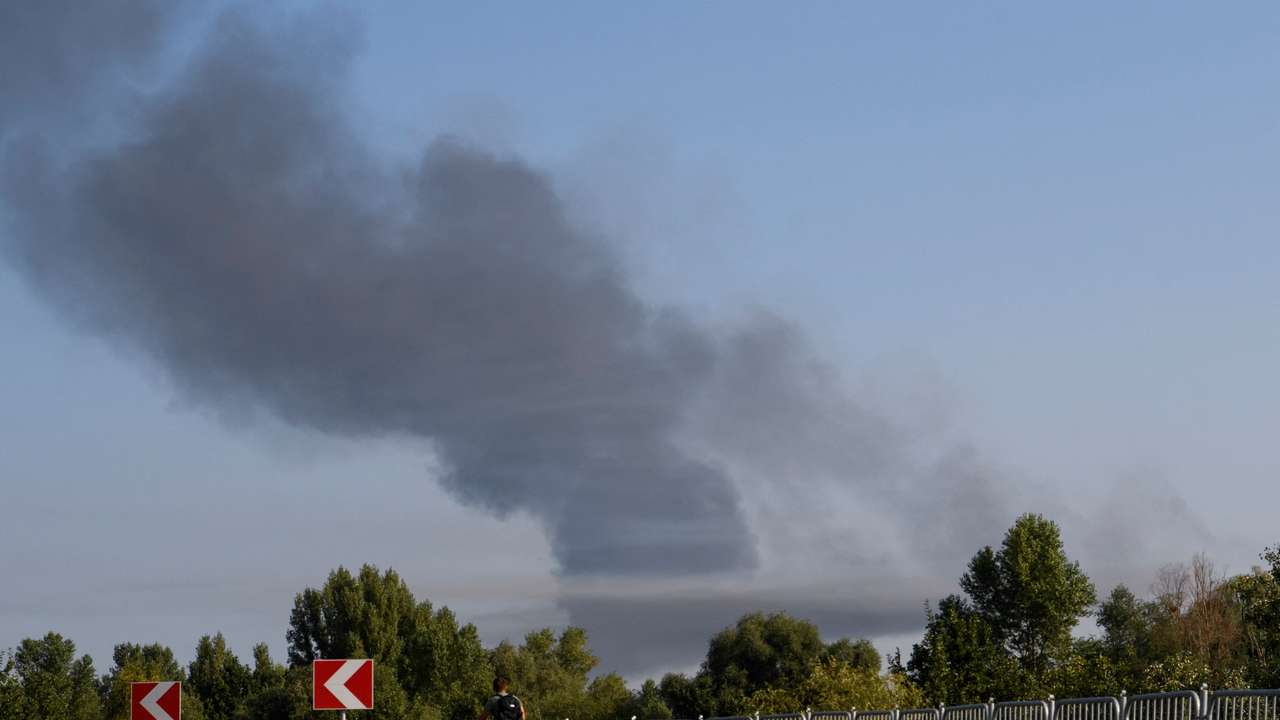 Smoke rises during a Russian missile and drone attack on outskirts of Kyiv