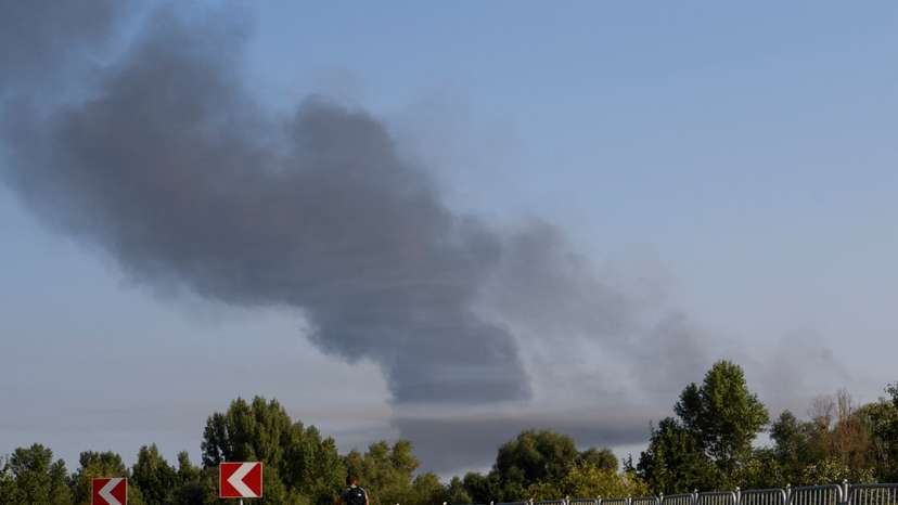 Smoke rises during a Russian missile and drone attack on outskirts of Kyiv
