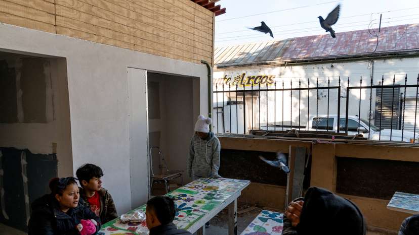 FILE PHOTO: Asylum seekers attend a church service ahead of the inauguration of U.S. President-elect Donald Trump