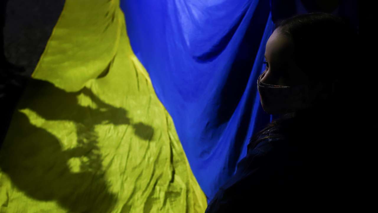 People protest against the massive military operation by Russia against Ukraine, in front of the Ukrainian Embassy in Buenos Aires
