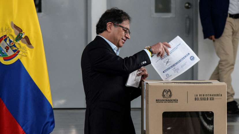 Colombian President Gustavo Petro votes during the elections for governors, regional lawmakers and mayors, in Bogota