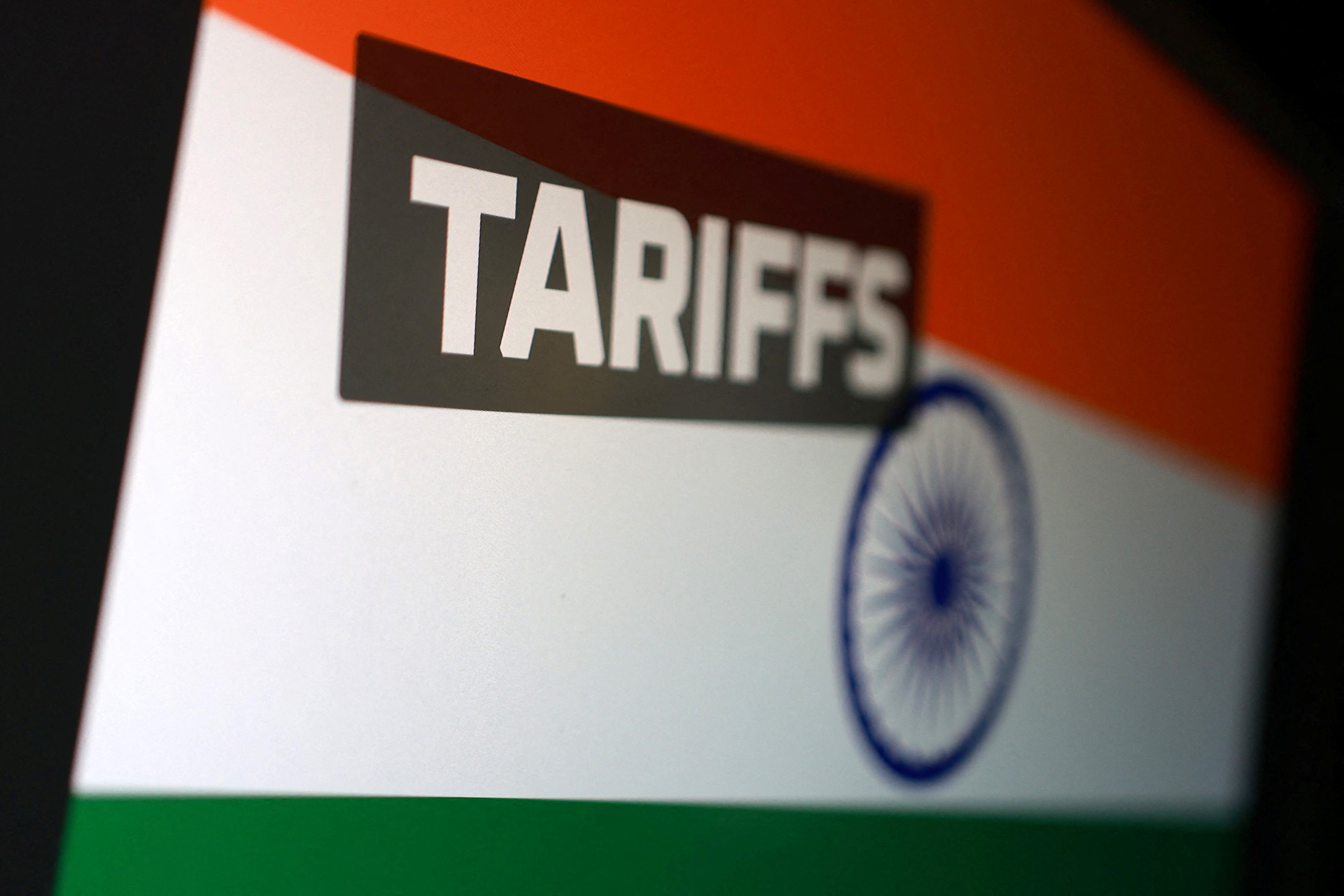 Illustration shows Indian flag and word Tariffs