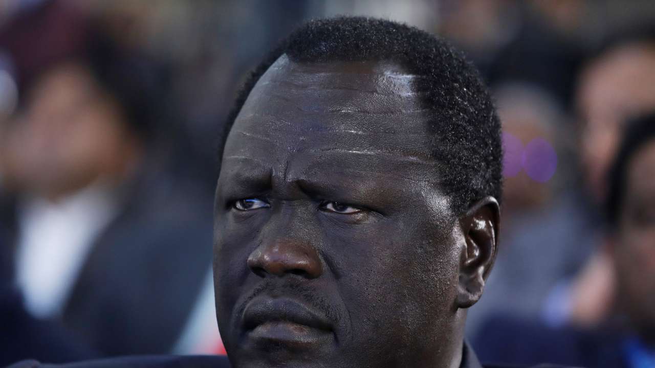 South Sudan's Minister of Petroleum, Ezekiel Lol Gatkuoth listens to a speech during Petrotech conference in Greater Noida