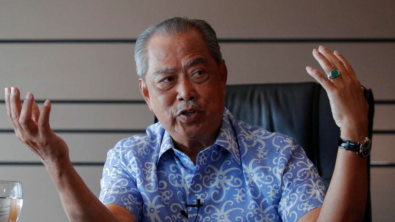 Malaysian opposition leader and former premier Muhyiddin Yassin speaks during an interview at Kuala Lumpur