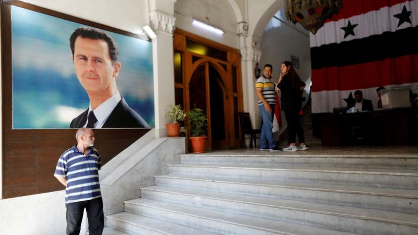 Syrians vote in parliamentary elections, in Damascus