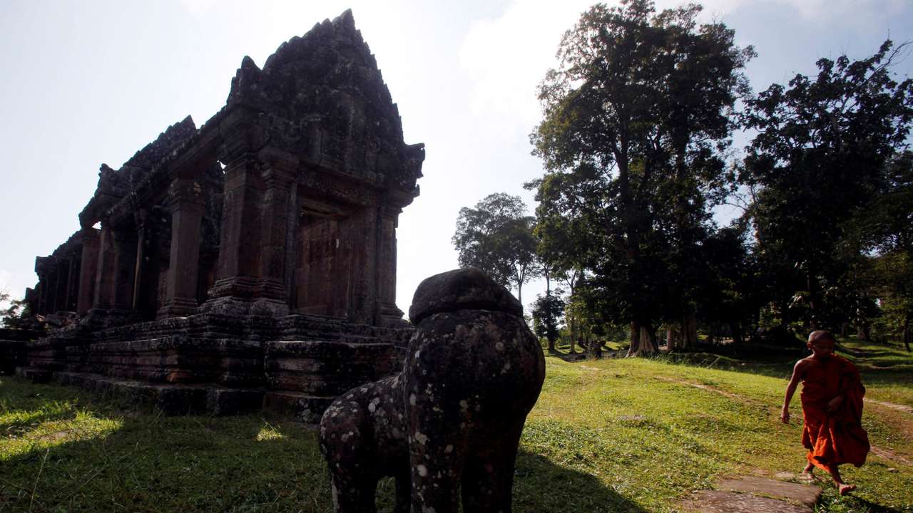 FILE PHOTO: A Buddhist monk visits the Preah Vihear temple on the border between Thailand and Cambodia