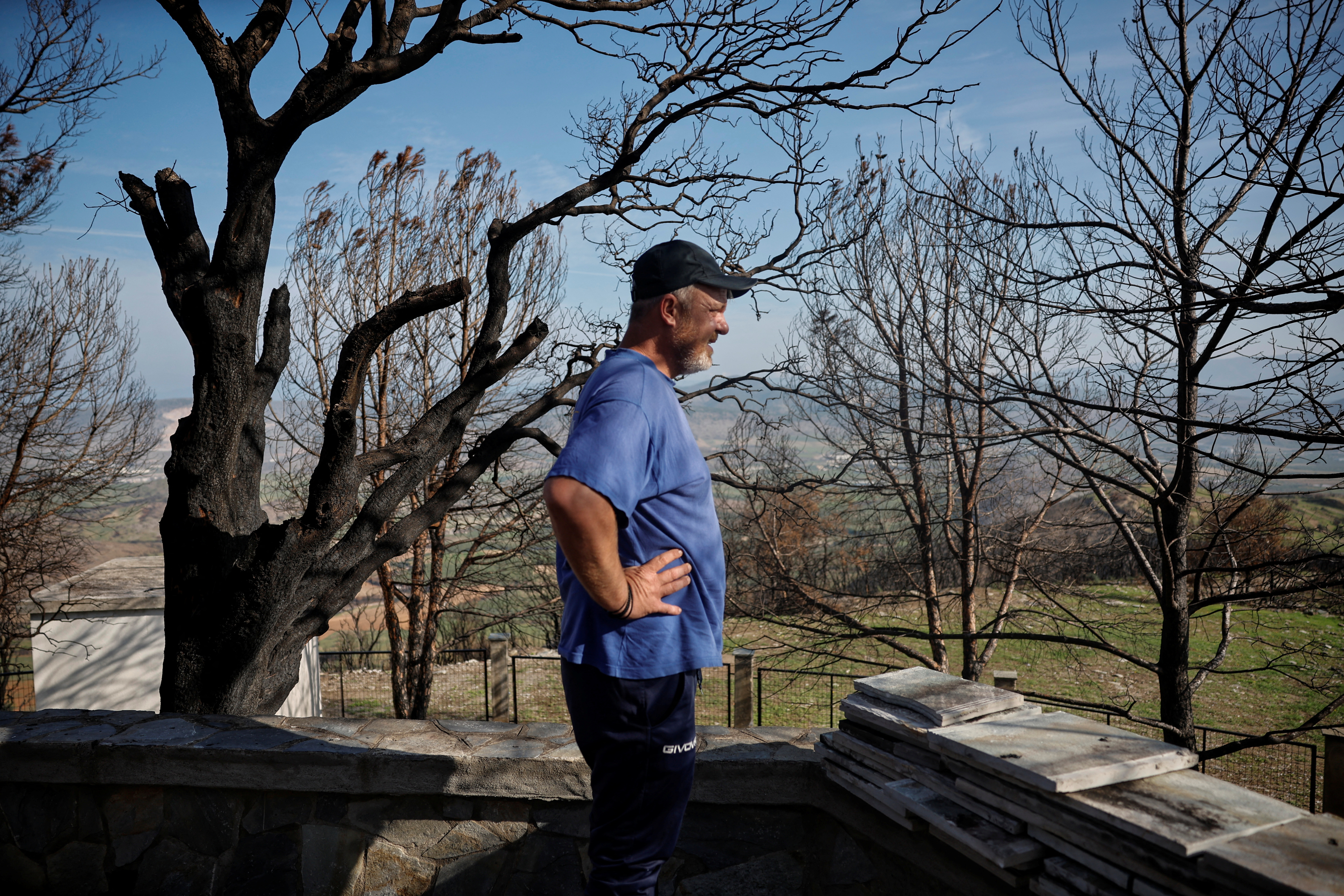 The Wider Image: Hit by floods and fires, Greek villager has lost hope