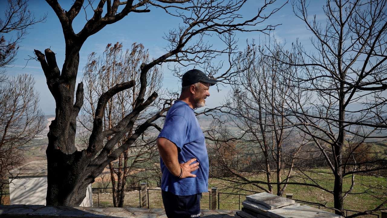 The Wider Image: Hit by floods and fires, Greek villager has lost hope