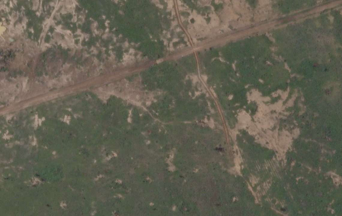 A satellite image shows a newly-built trench near Barsalogho