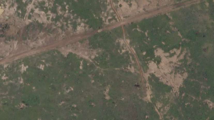A satellite image shows a newly-built trench near Barsalogho