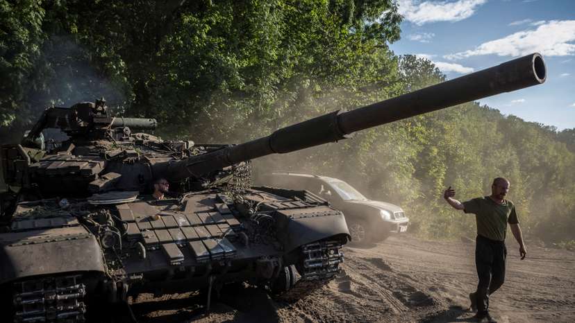 Ukrainian serviceman operates a tank near the Russian border in Sumy region