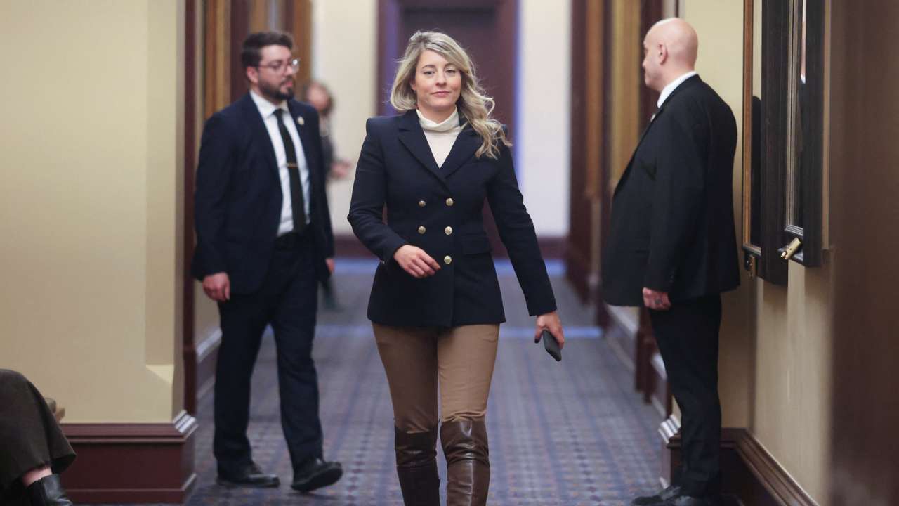 Canada's Minister of Foreign Affairs Melanie Joly returns to a caucus meeting after a break on Parliament Hill in Ottawa