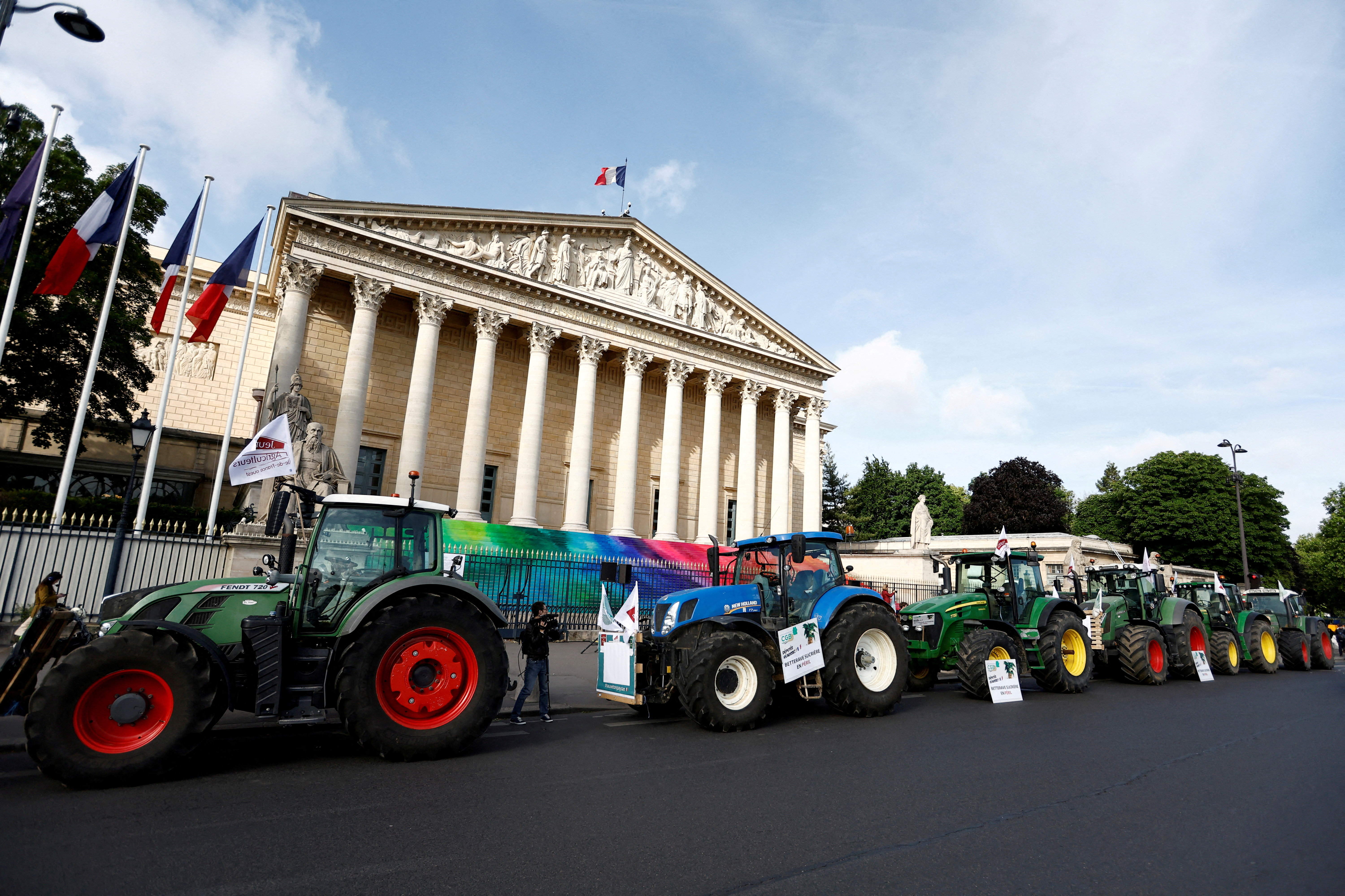 FILE PHOTO: French farmers protest in front of the French parliament in Paris