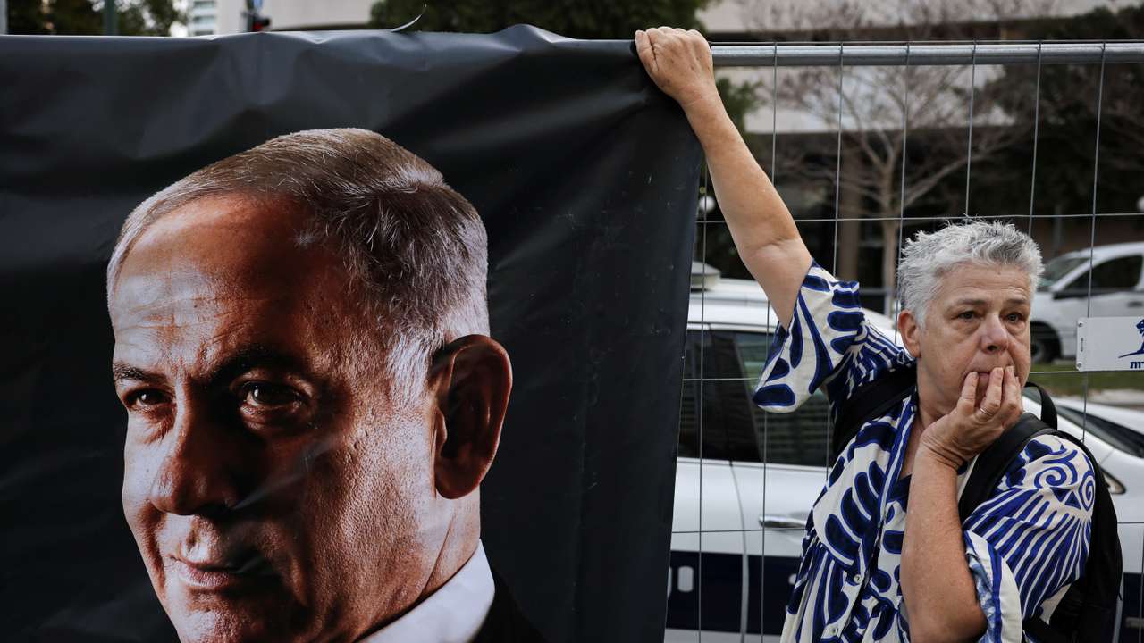 Protest outside the court where Israel's Prime Minister Netanyahu is due to take the stand for the first time in his long-running corruption trial, in Tel Aviv