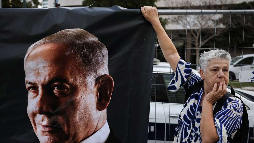 Protest outside the court where Israel's Prime Minister Netanyahu is due to take the stand for the first time in his long-running corruption trial, in Tel Aviv
