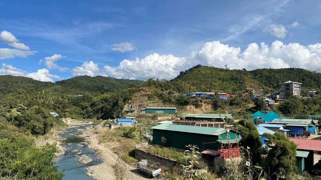A view of Myanmar's Khawmawi village on the India-Myanmar border across the Tiau river as seen from Zokhawthar village