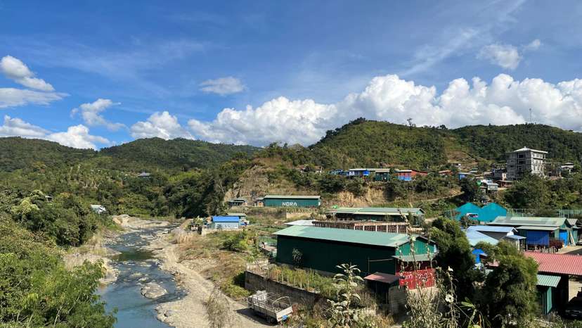 A view of Myanmar's Khawmawi village on the India-Myanmar border across the Tiau river as seen from Zokhawthar village