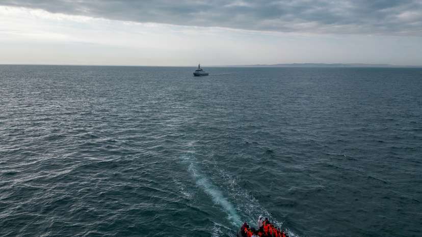 FILE PHOTO: Migrants cross the English Channel in small boats