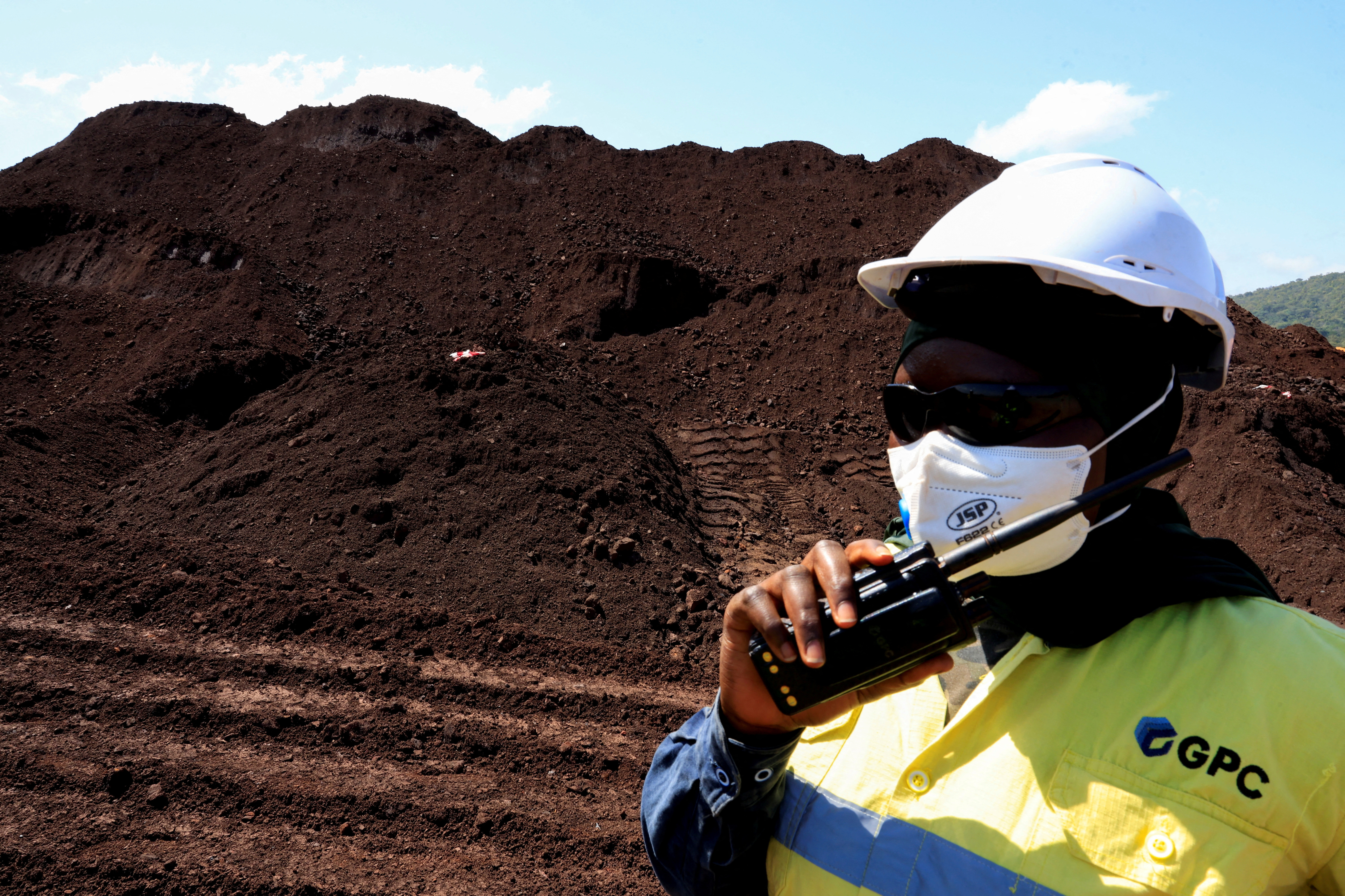 FILE PHOTO: Guinea announces start of production at Simandou iron ore mine project