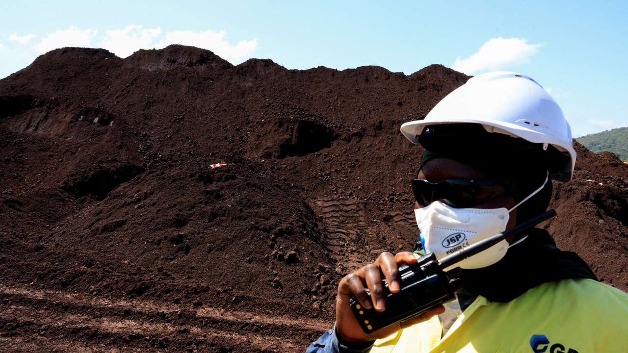 FILE PHOTO: Guinea announces start of production at Simandou iron ore mine project