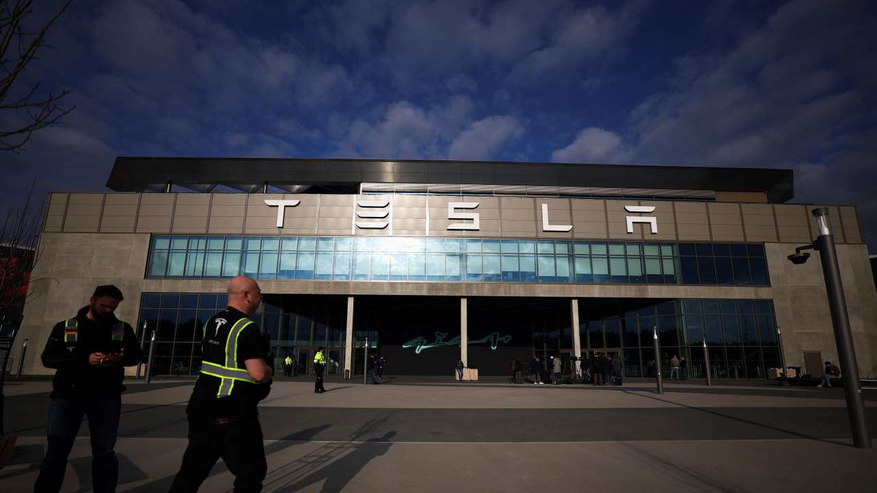 Tesla's Gigafactory halts its production after a suspected arson attack, in Gruenheide
