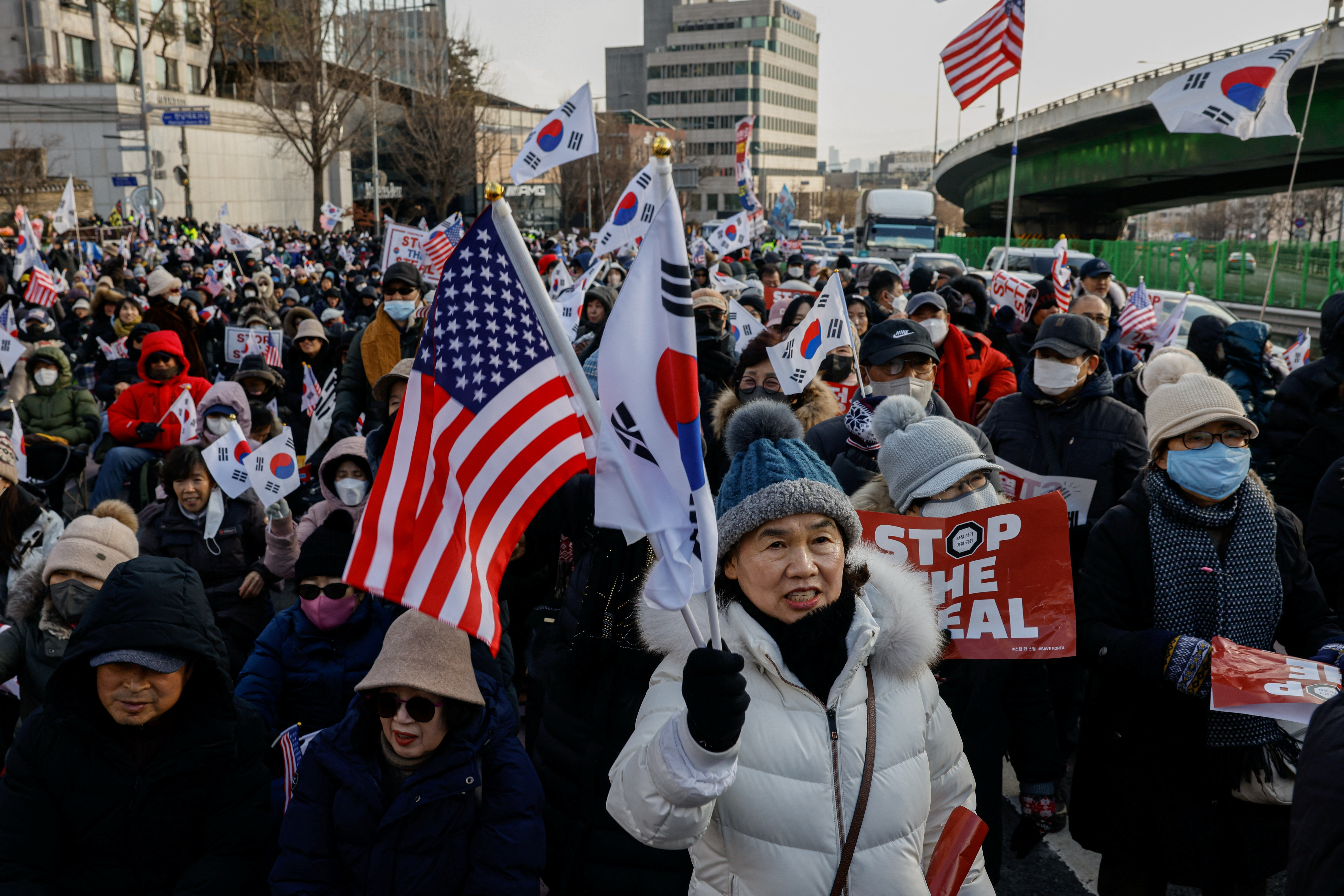 Pro-Yoon protesters take part in a rally to support impeached South Korean President Yoon Suk Yeol near his official residence in Seoul