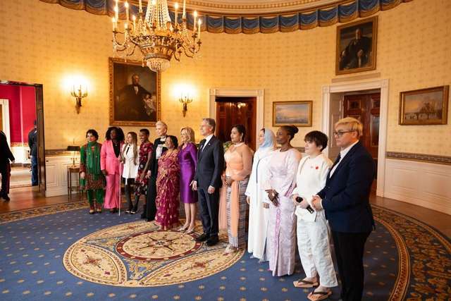 International Women of Courage awardees pose with US Secretary of State Anthony Blinken