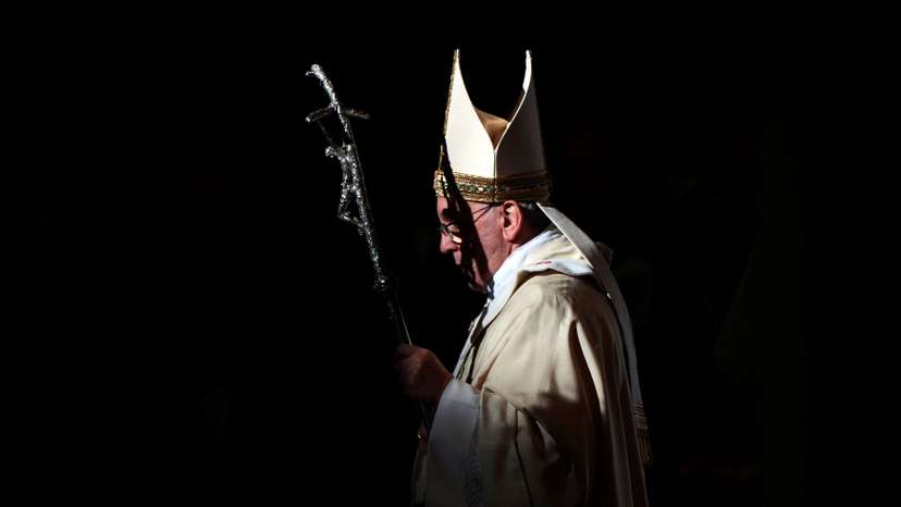 FILE PHOTO: Pope Francis walks with his pastoral staff as he leads the Epiphany mass in Saint Peter's Basilica at the Vatican