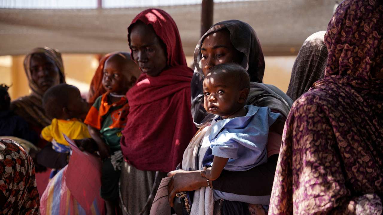 FILE PHOTO: Handout photograph of a woman and baby at the Zamzam displacement camp in North Darfur