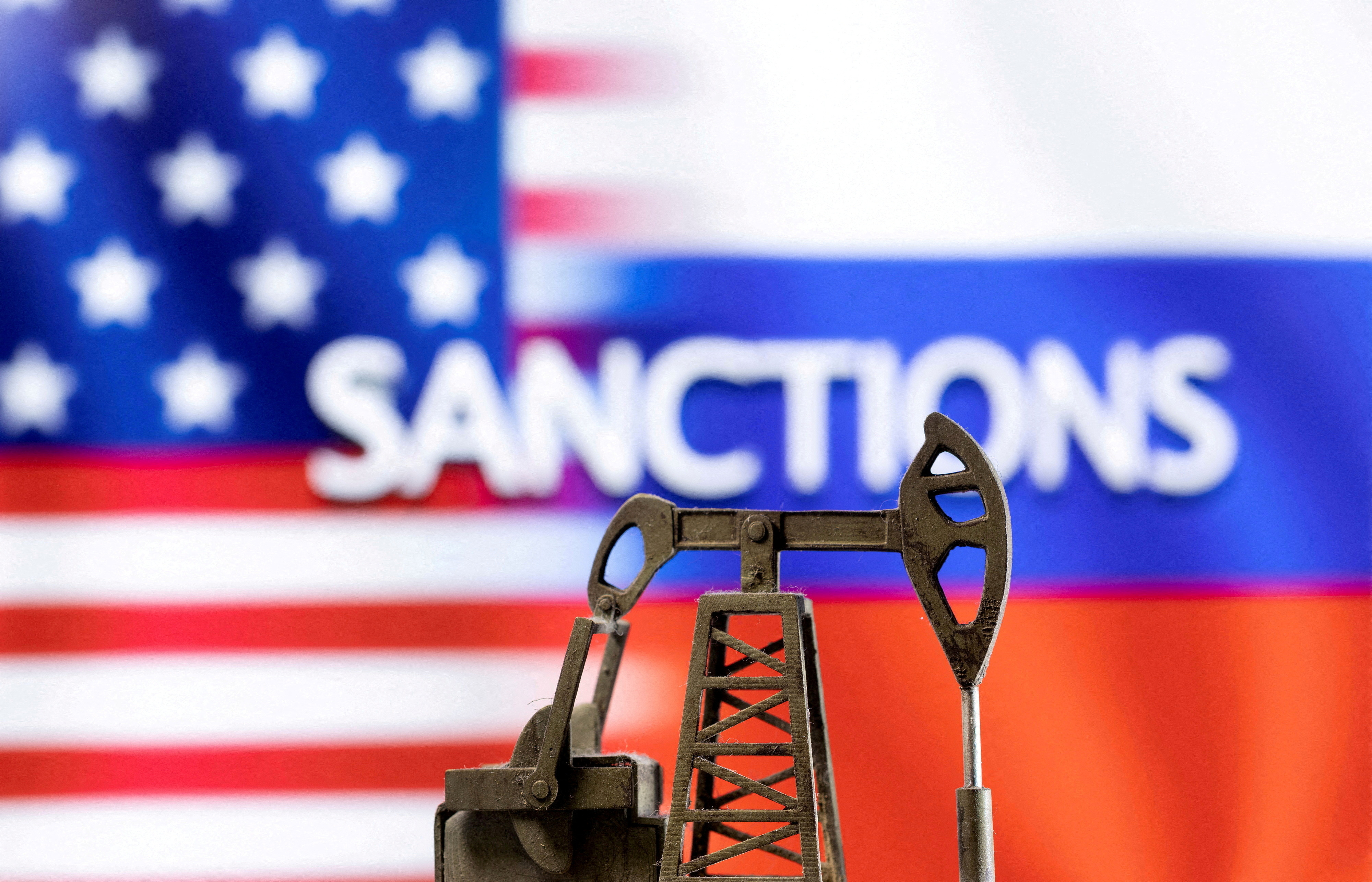 FILE PHOTO: U.S. and Russian flags are seen in this illustration