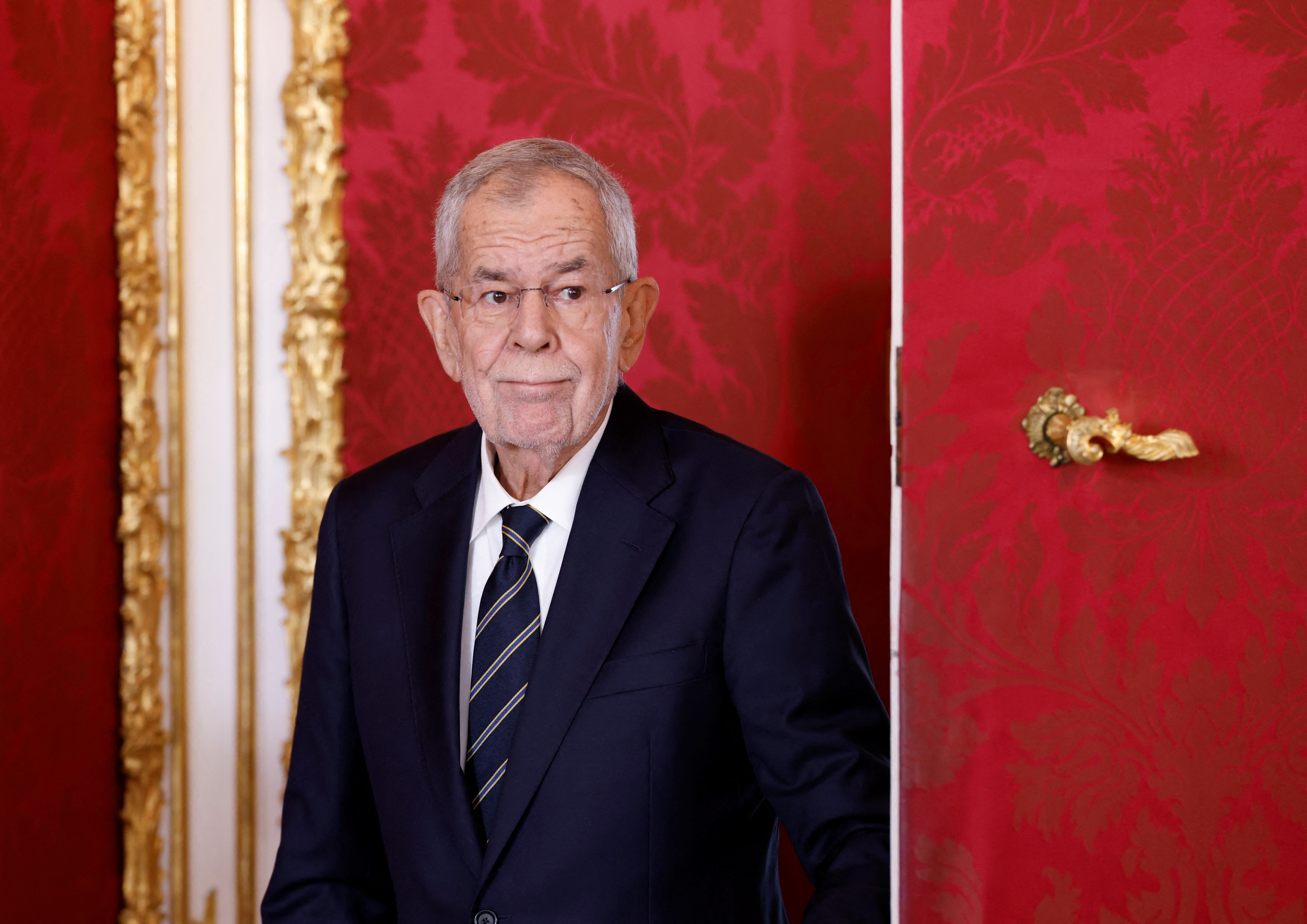 Austrian President Alexander Van der Bellen arrives for a statement in Vienna