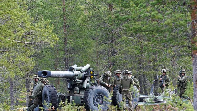 FILE PHOTO: Finland hosts its first military exercise as a NATO member in the High North above the Arctic Circle
